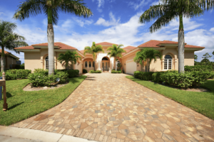 Coastal home exterior with palm trees